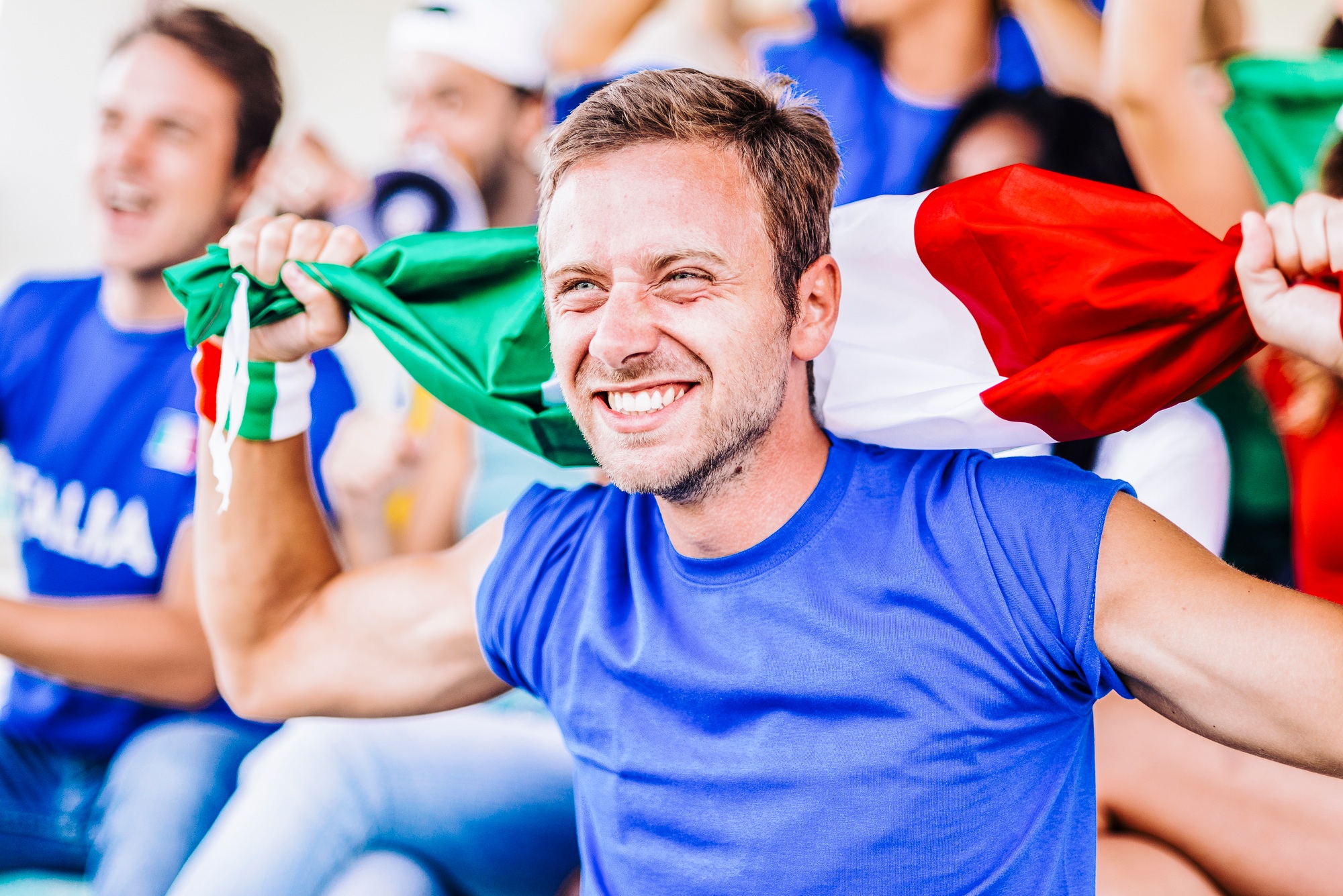 Supporters from Italy at stadium watching the match
